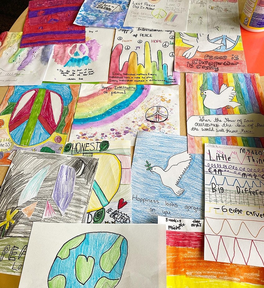 Students make cards and flags to represent what peace means to them. Courtesy photo.