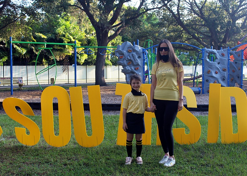 The Rivalta family wears gold shirts in support of the fundraiser. Brynn Mechem