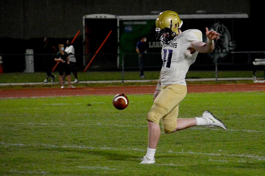 Booker junior Nate Williams blasts a punt.