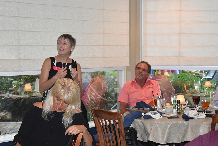 Liz Sparr stood to speak about her business, Tidewell Hospice.