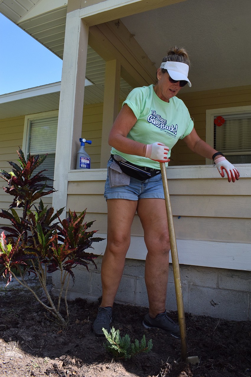 Pamela Zitkus with Purmort and Martin Insurance Agency loves planting, so when she heard that was part of the Foundations for Dreams project for Alliance Gives Back she jumped at the opportunity to volunteer.