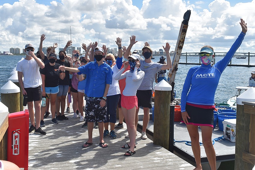 Volunteers pose for a group photo before heading out.