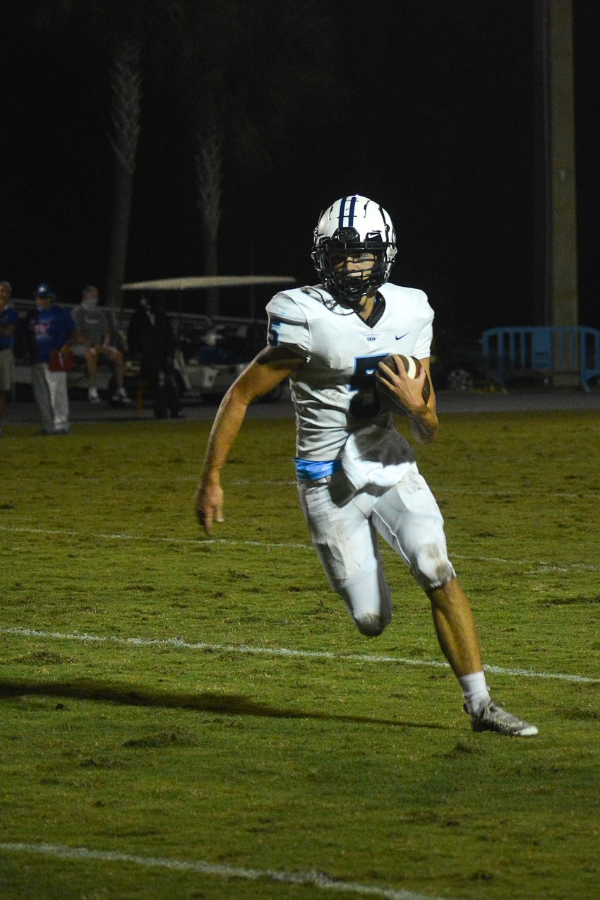 Tyler Beasley scampers up the field.