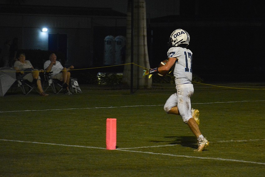 Connor Pope crosses the goal line for a touchdown.