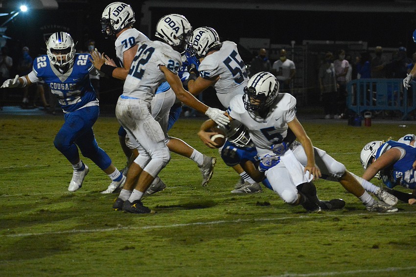 Tyler Beasley falls forward for a short gain.