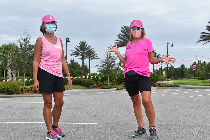 Jean Montgomery (left) and Bev Specht jogged throughout the walk-a-thon and became the first participants to finish the course.