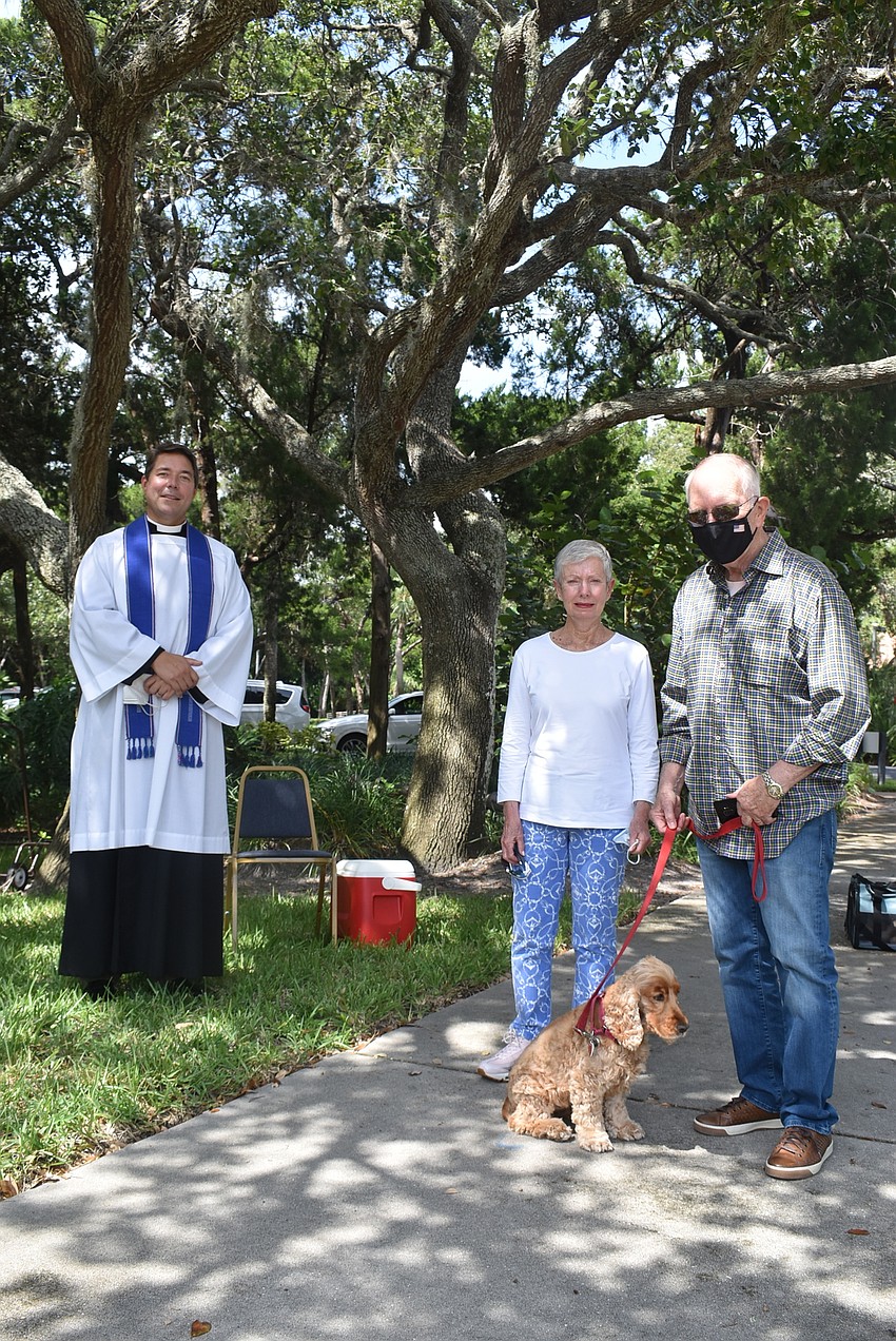 Father Dave Marshall with Gay, Maggie and Jerry Bowles