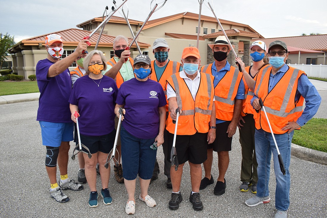 Lang Wooddy, Bill Porter, MariAnne Wooddy, Paul Oakes, Sybil Porter, Terry Byce, Chuck Glazer, Jim Wingert, Laura Adcock and Fred Lopez represented the Rotary Club of Lakewood Ranch in an Oct 3 cleanup of Lorraine Road.