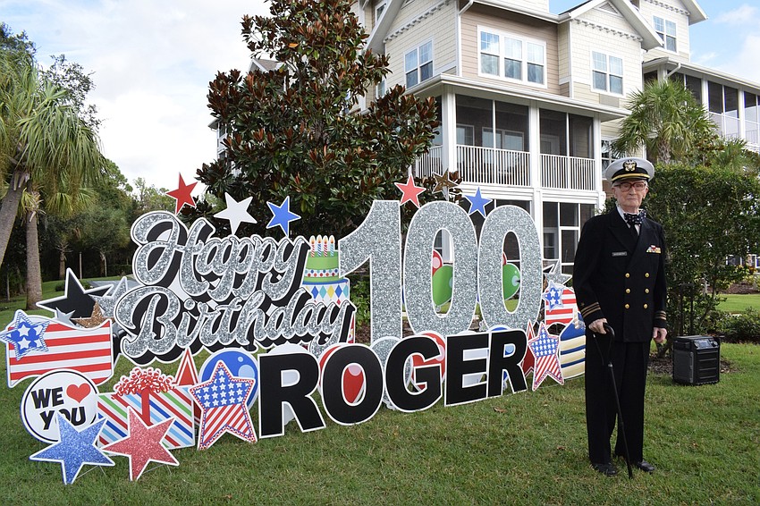 Roger Quisenberry, a resident at Cypress Springs Gracious Retirement Living, celebrates his 100th birthday with a surprise parade.