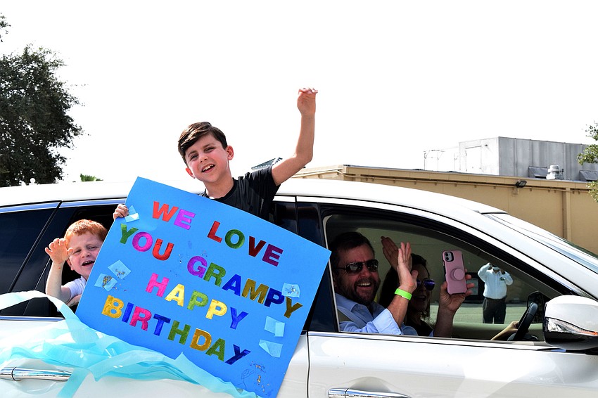 Aiden Quisenberry, who is 5, and Jackson Quisenberry, who is 9, wish their 