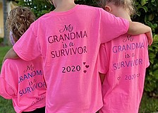 B.D. Gullett Elementary students Aubrey Balderama and her sisters, Mattison and Harper, wear pink shirts in honor of their grandmother, who is a cancer survivor. Courtesy photo.
