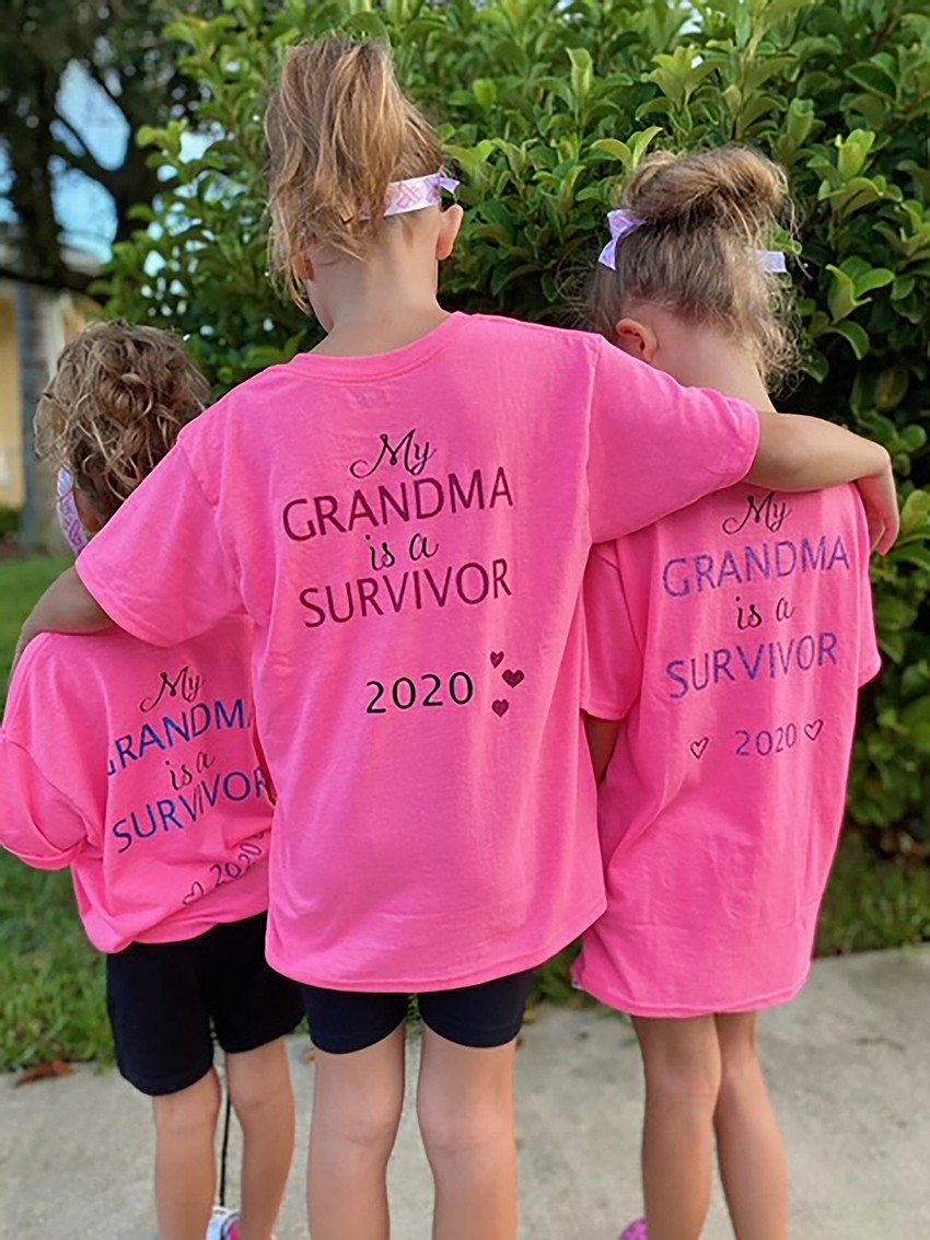B.D. Gullett Elementary students Aubrey Balderama and her sisters, Mattison and Harper, wear pink shirts in honor of their grandmother, who is a cancer survivor. Courtesy photo.