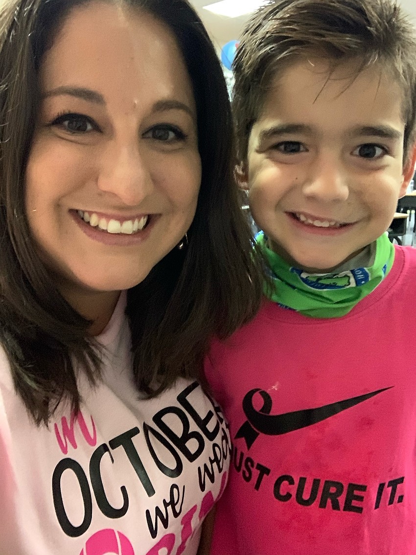 Jackie Stark, a first grade teacher, and her son, Alex Stark, wear pink shirts as part of Pink Out Day. This is the second year B.D. Gullett Elementary does a Pink Out Day every Tuesday in October. Courtesy photo.
