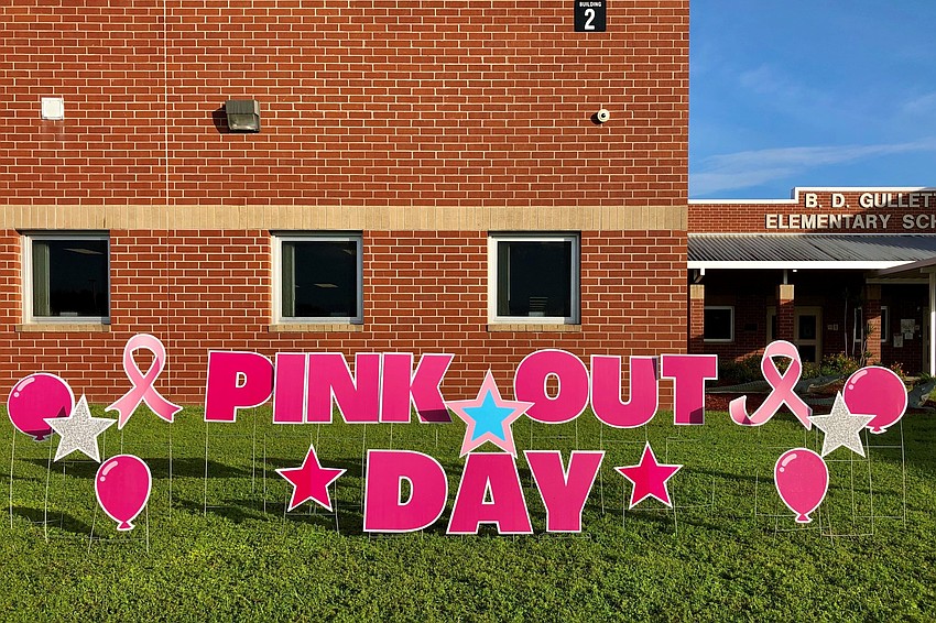 Sunshine Yard Cards provides signs for B.D. Gullett Elementary School's Pink Out Day. The school will have a Pink Out Day every Tuesday during October, which is Breast Cancer Awareness Month. Courtesy photo.
