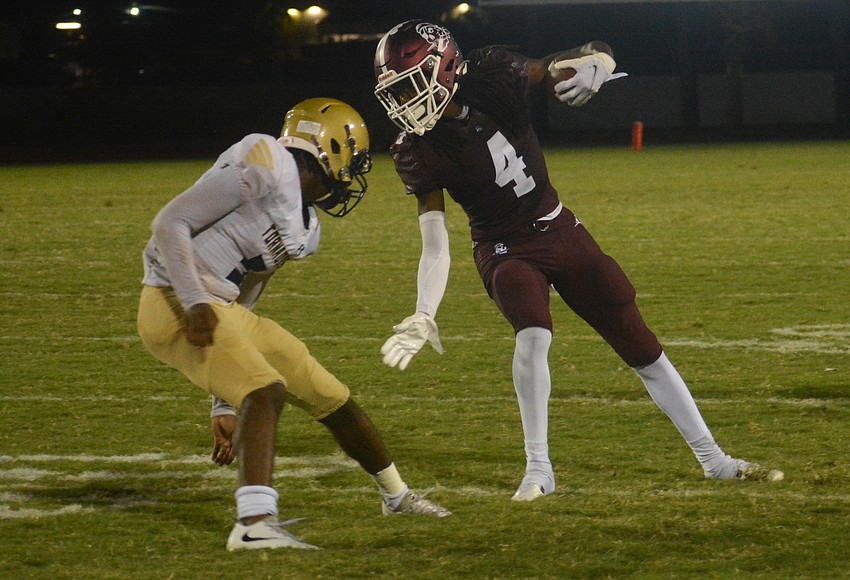 Your Observer | Photo - Pirates senior wideout Gregory Cotton jukes a ...