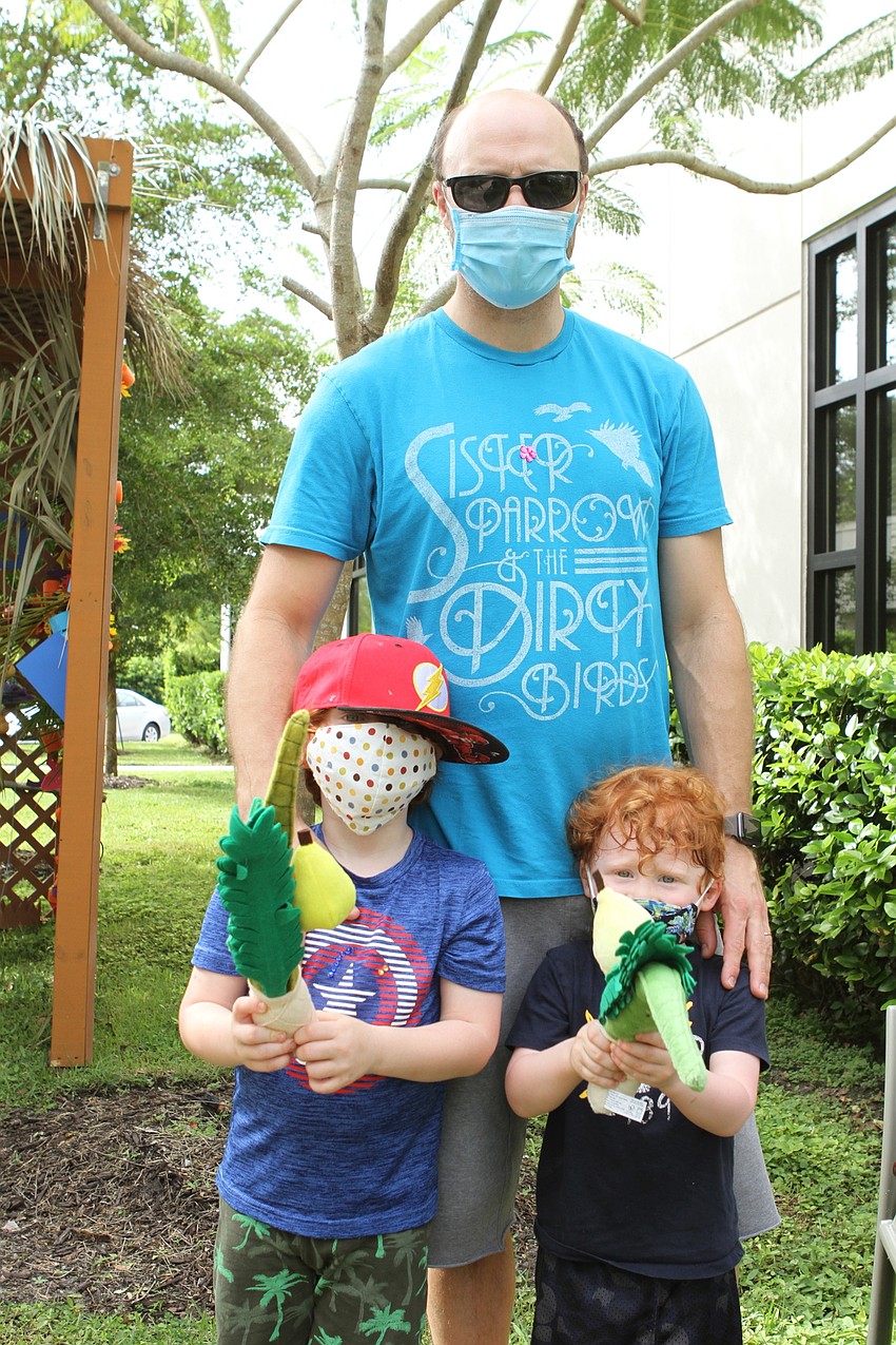 Avi, Fane and Joah Sigel played around after the parade.