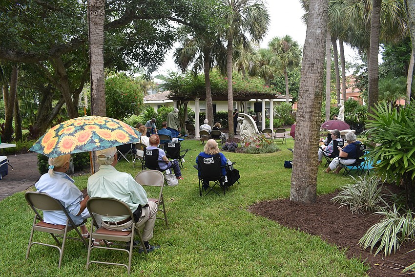 Under the trees, a light dripping drizzle persisted.