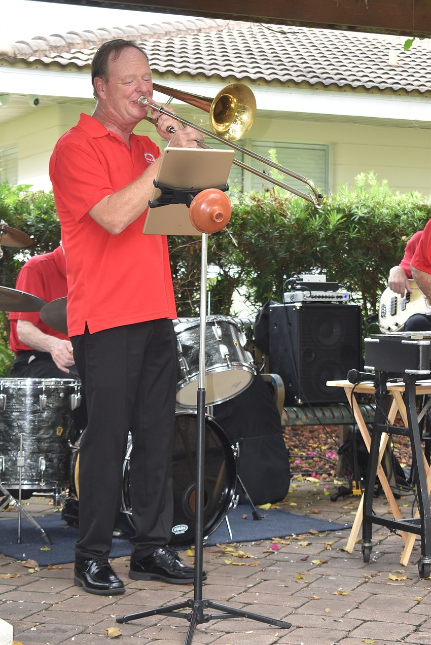 Dan Dodds on trombone.