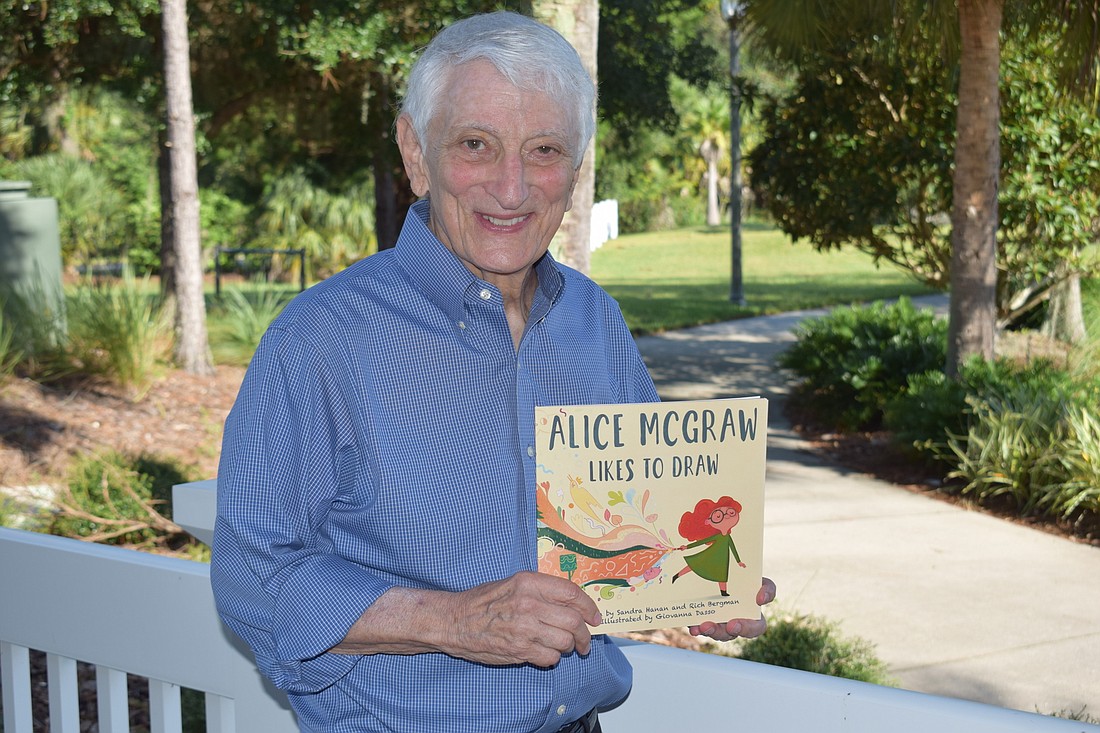 Lakewood Ranch&#39;s Rich Bergman holds his newest book, "Alice McGraw Likes to Draw."