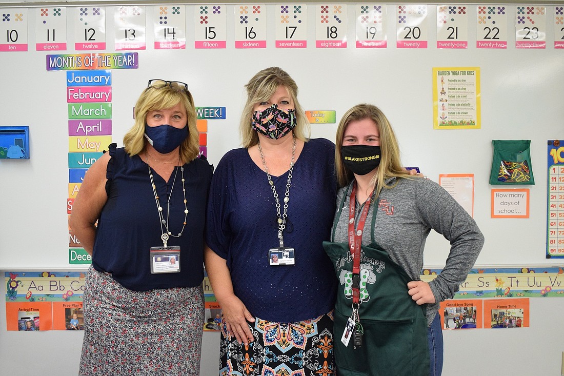 Cari Whiddon, voluntary pre-K manager for the School District of Manatee County, Catherine Schutte, the pre-K teacher, and Brooke Rypel, a senior at Lakewood Ranch High School, can&#39;t wait for the Mini Mustangs program to return.