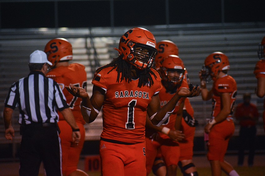 Terrell Pack shrugs after scoring his second touchdown.