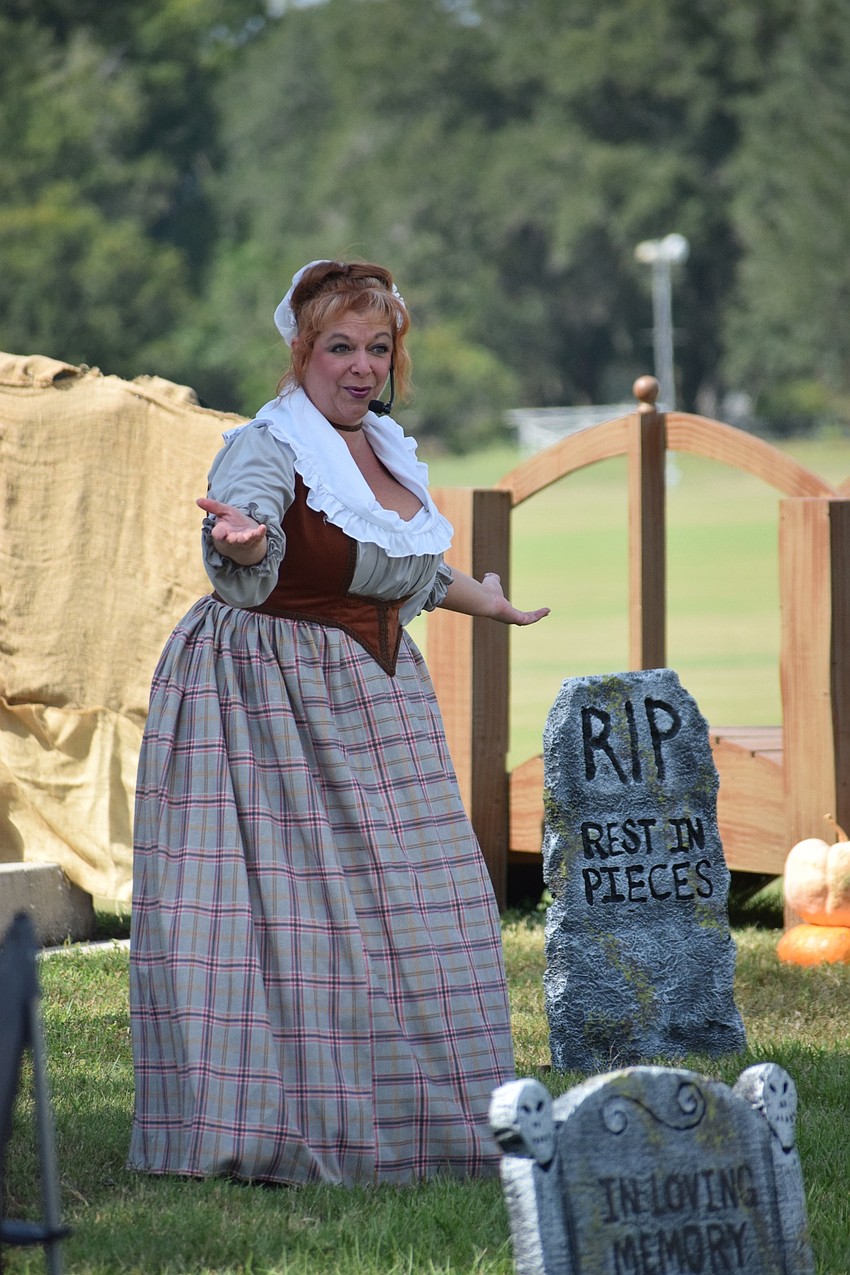 Widow Van Doorn (Andrea Keddell) kicks off the performance of 