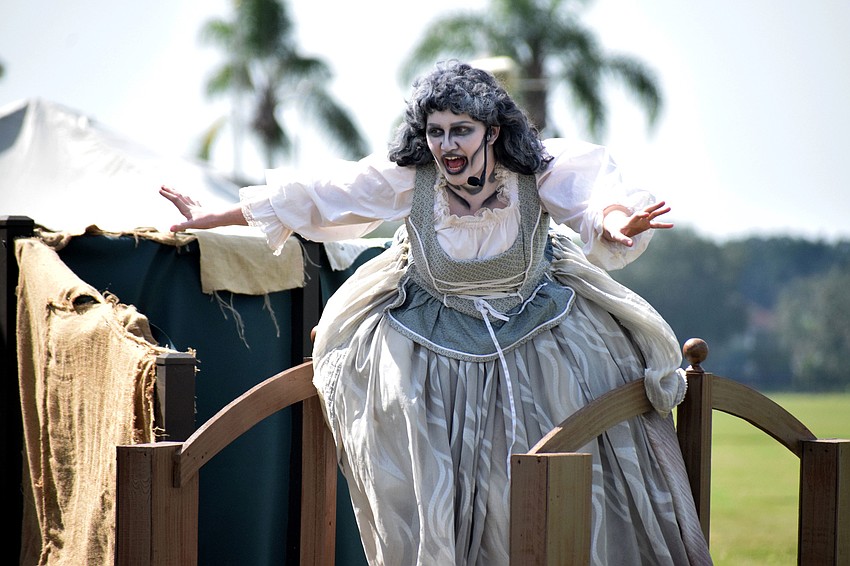 The Woman in White (Yvonne Clark) screams 