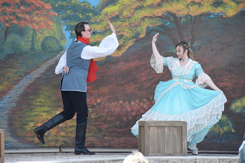 Ichabod Crane (Philip Troyer) dances with Katrina Van Tessel (Brenna Griffith). Actors were socially distant while performing.