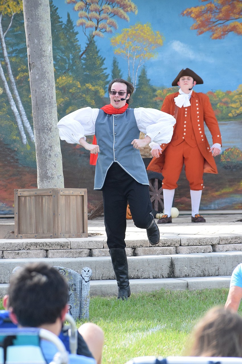 Ichabod Crane (Philip Troyer) shows Yost Van Ripper (Auggie Toynton) how to do the 