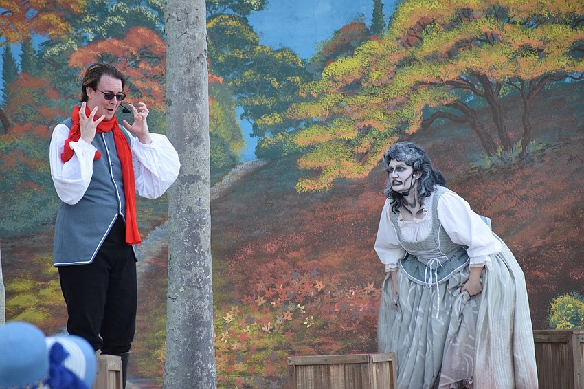 Ichabod Crane (Philip Troyer) gets scared by the presence of the Woman in White (Yvonne Clark).