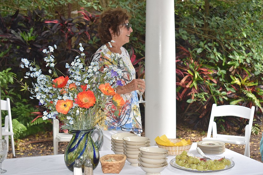 Lesley Rife greets friends.