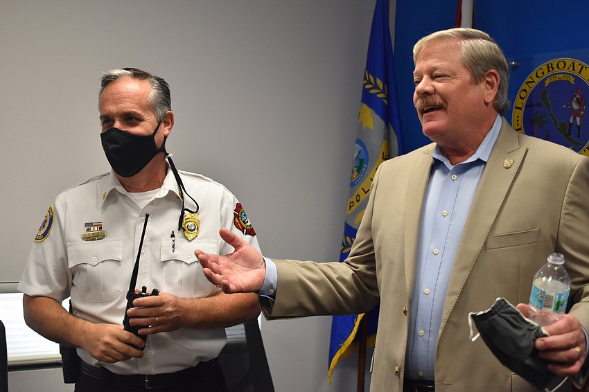Fire Chief Paul Dezzi (left) and retiring Police Chief Pete Cumming (right).