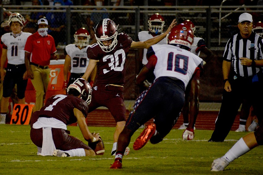 Braden River's Colin Boyd (30) nails a field goal to open the scoring.