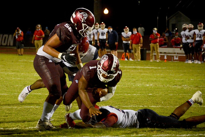 Braden River's Jaheim Hodo falls forward for extra yardage.