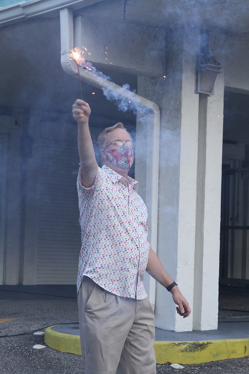 Ken Junkins waved his sparkler.