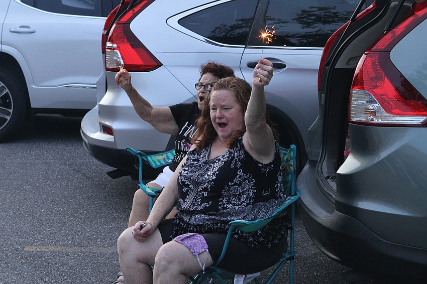 Madri and Pam Wilson cheered from their seats.