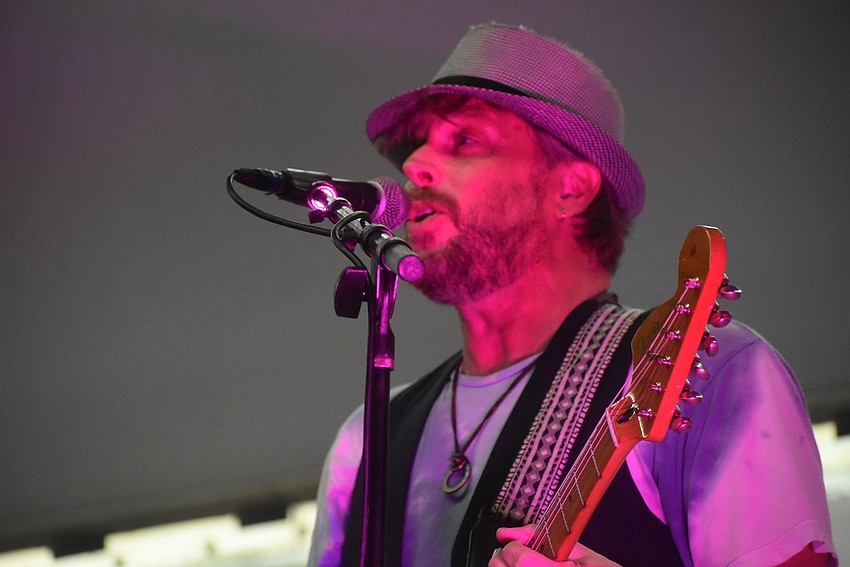 In addition to playing guitar, Greg Czinke provides backup vocals for the Black Honkeys.