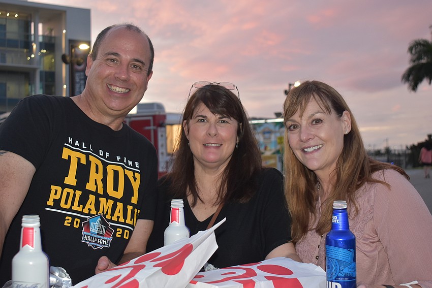 (From left) Michael Meinhardt of Sarasota, Deena Spencer of Sarasota and Denise Keller of Willowbrook came to Fiesta Friday because it was 