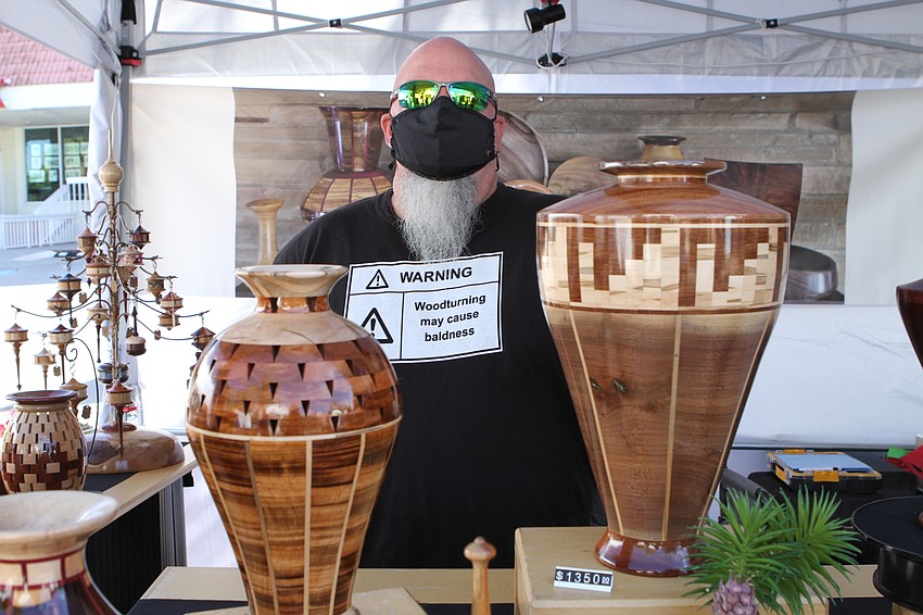 John Anderson displayed his wood art at his Turning Over A New Log booth.