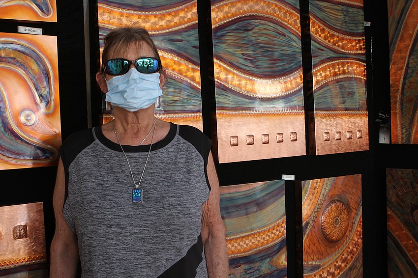 Faye Boyce and Robert Boyce manned their copper artwork booth.