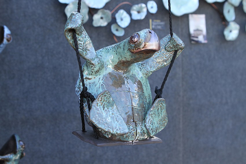 Gerald Todd Vaughn had a swinging turtle sculpture.