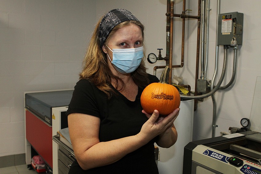 Sara Malone admired her finished pumpkin.