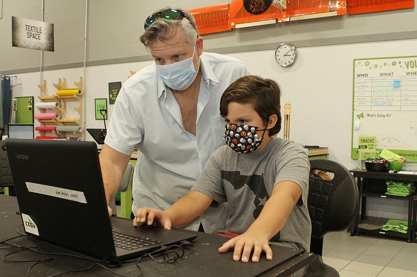 Josh and Jackson Lizotte eyeballed different designs.