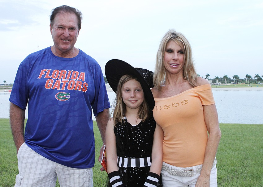 Randy and Paizley Platfoot walked around with Leanne McVicker