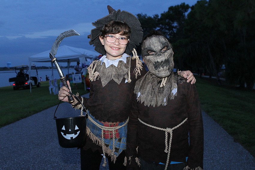 Lyra and Orion Avery were a couple of scarecrows.