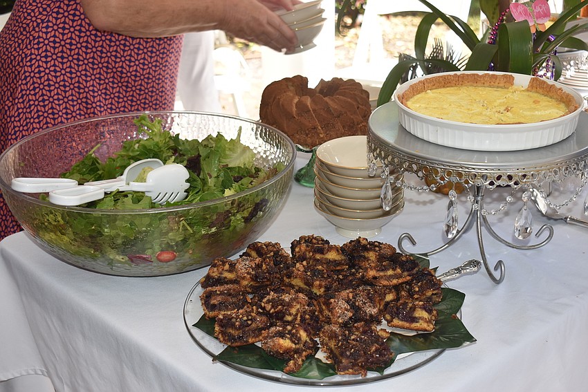 Salad, blueberry cake and quiche were the focal point of the outdoor meal.