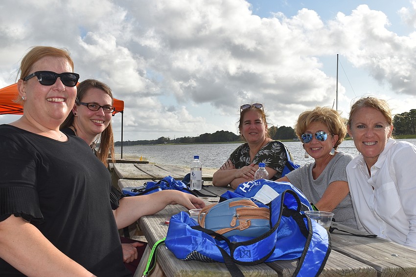(From left) Andrea Lowes, Meredith Mitchell, Jean Ward, Cindi Chiumento and Brigette Davis are searching for volunteers to work at Children First. Based in Newtown, Children First works to help low-income kids and their families.