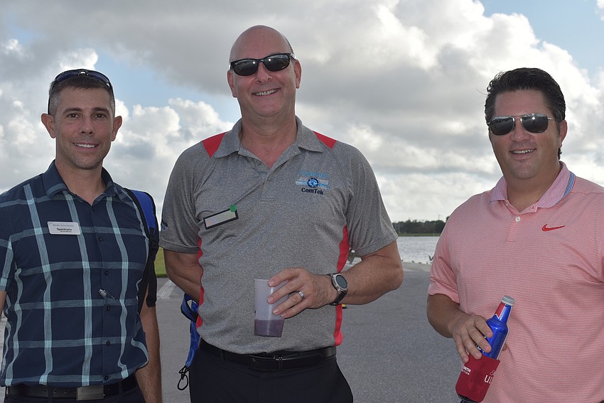 (From left) Brian Schnelzle of Spectrum, Bob MacDonald of Custom ComTek and Mark Kowalski of Purmont and Martin, all of which serve Lakewood Ranch, came to the event for networking.