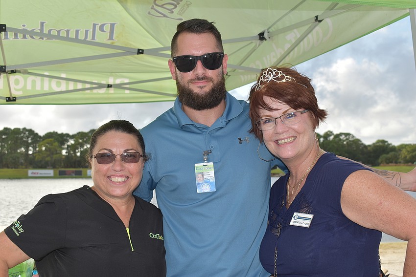 (From left) Debbie Shaffer, Kenneth Bannister and April Pyle came to the event for networking. Shaffer and Bannister work for Cool Today, an energy and plumbing company that serves people from Tampa to Naples.