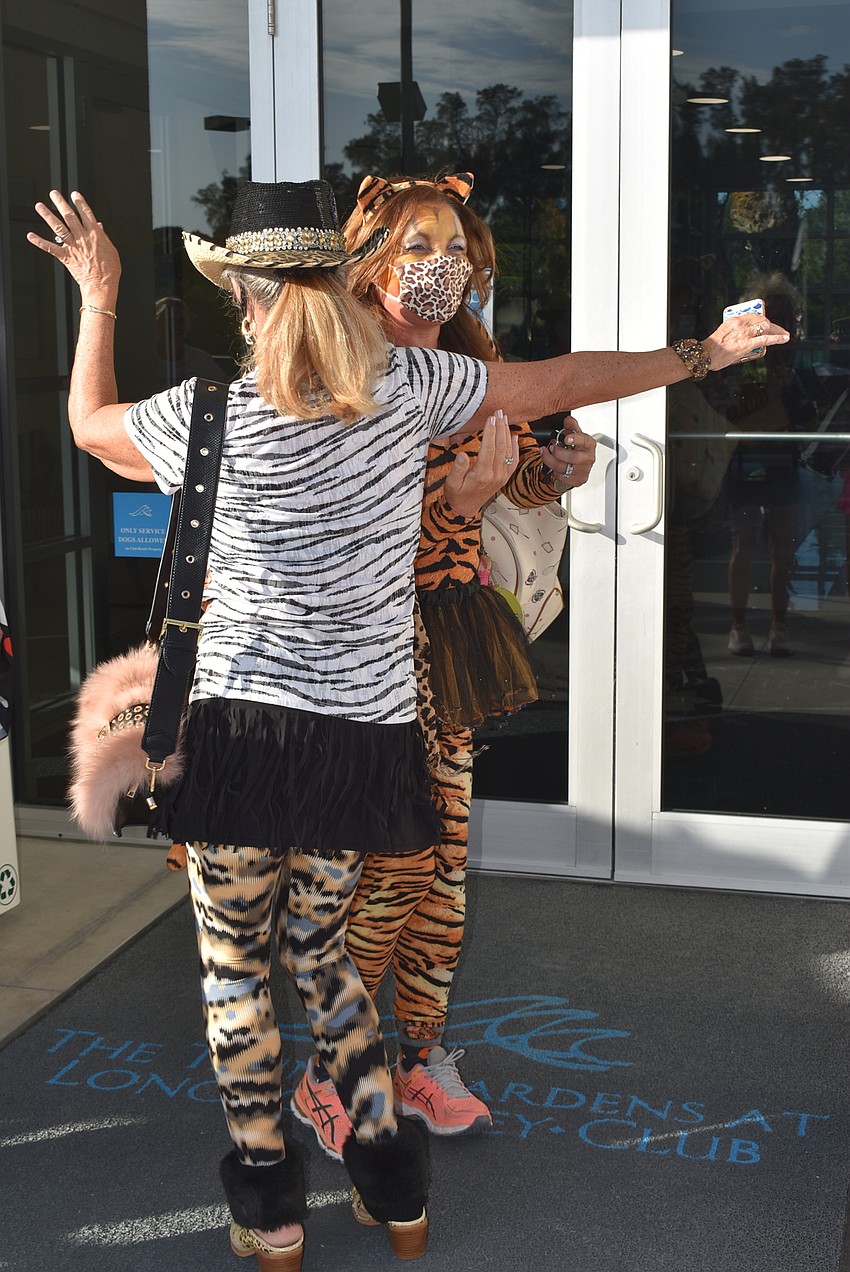Joanne Forch greets fellow tiger Paula Steptoe.